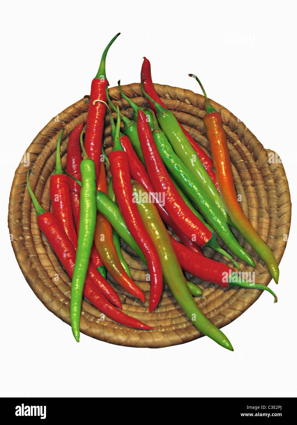 Common Chili, Capsicum annuum, Red and green chilies are together in a basket Stock Photo