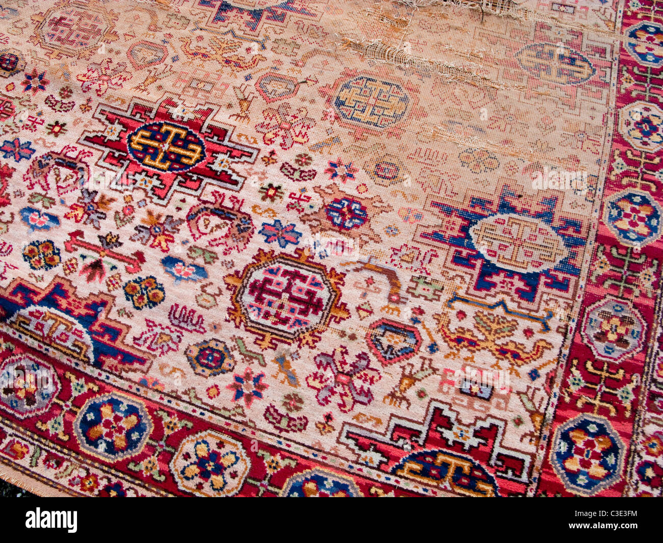 Well worn threadbare carpet Stock Photo Alamy