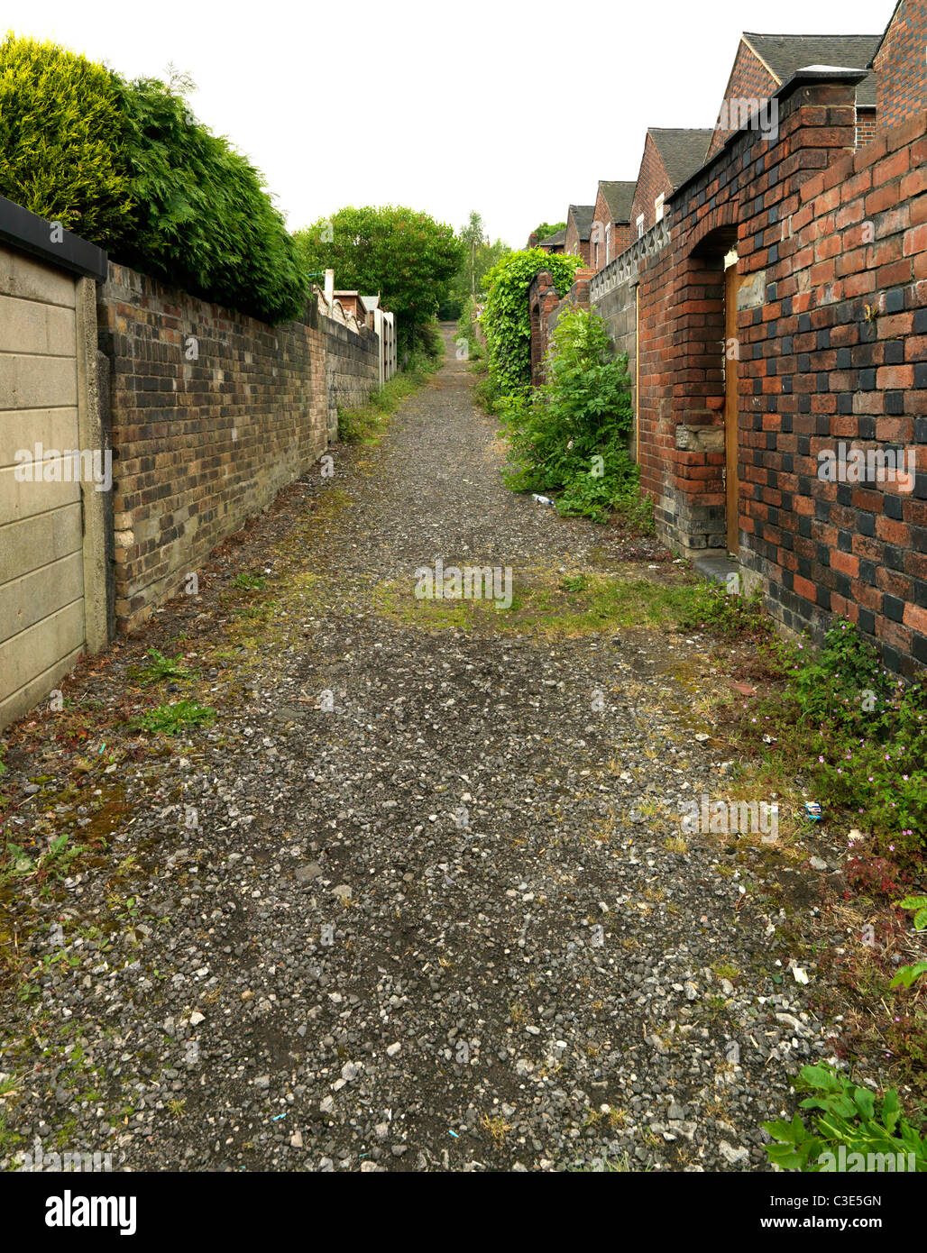 Back ally to terrace houses Stock Photo
