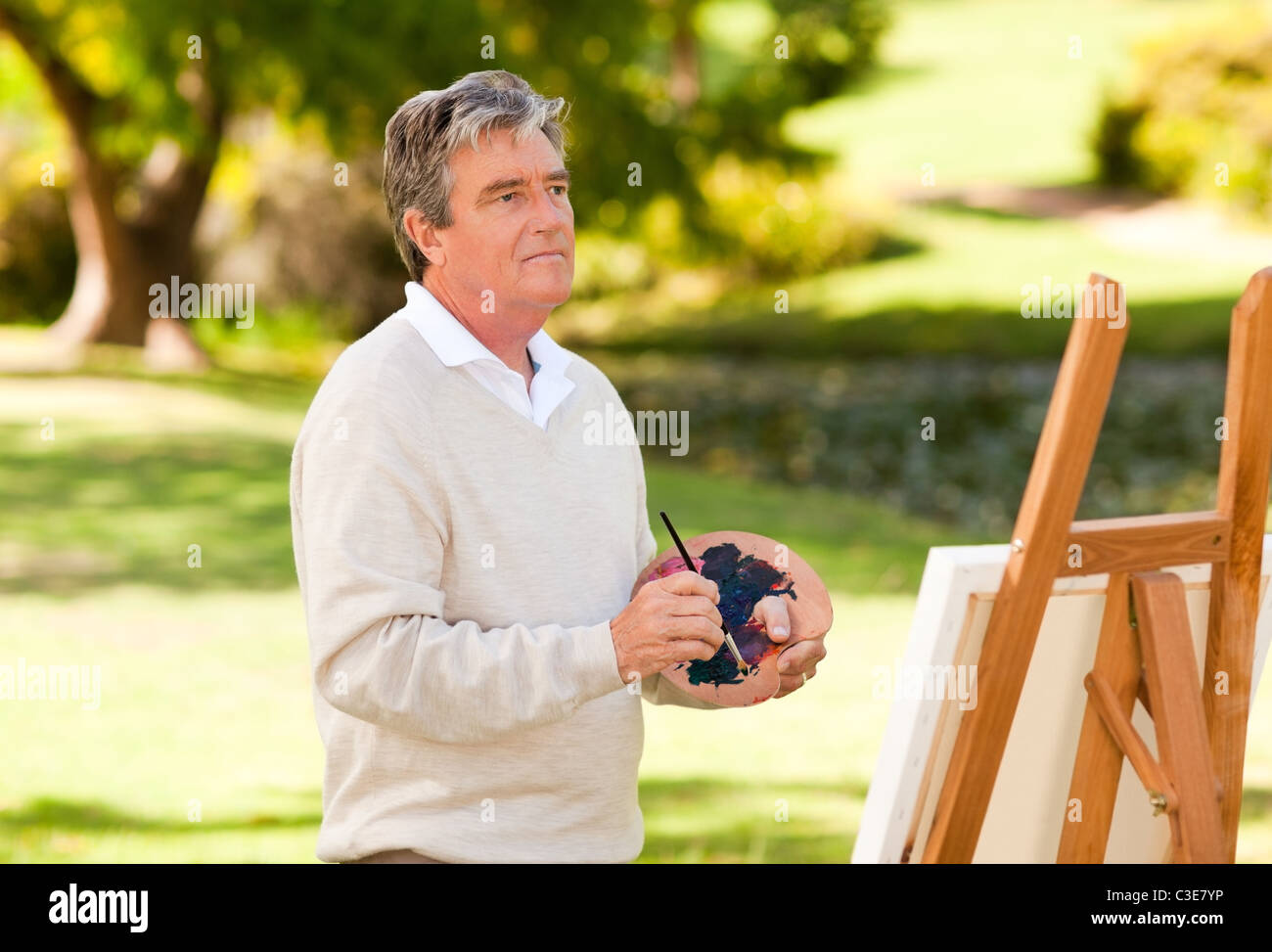 Elderly man in park hi-res stock photography and images - Alamy