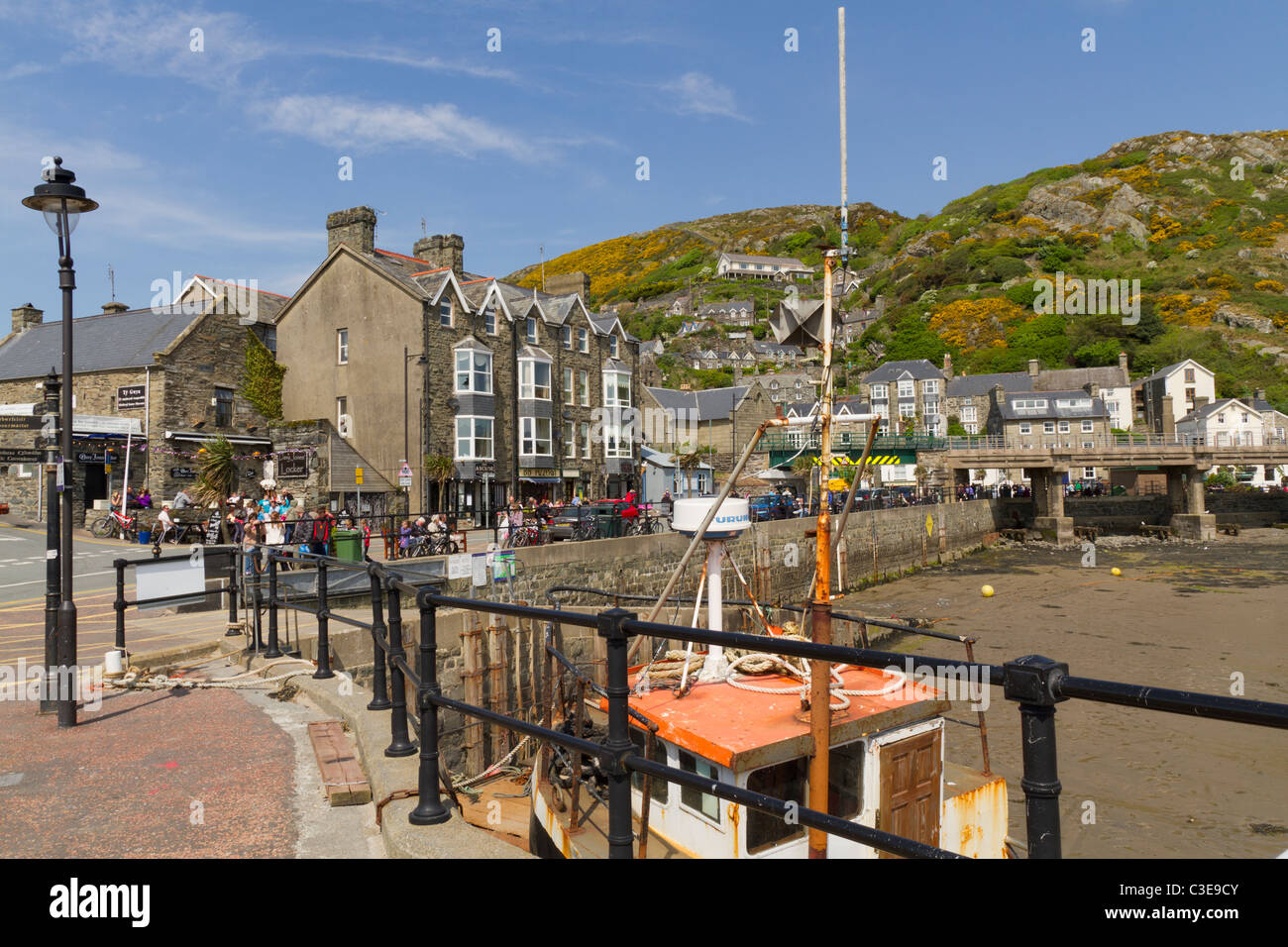 Cafes and shops around the harbour in Barmouth Wales Stock Photo ...