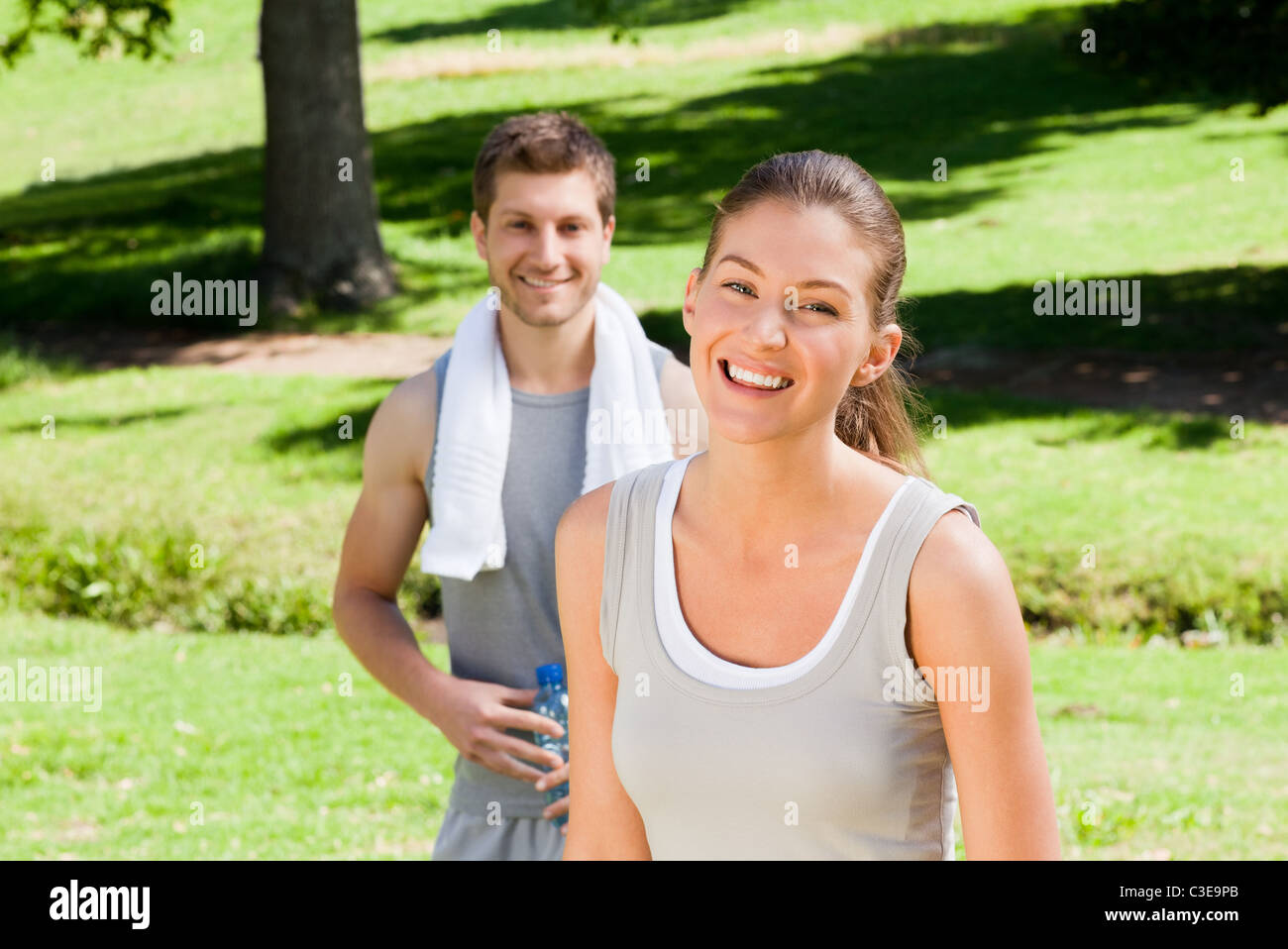 Sporty couple in the park Stock Photo - Alamy