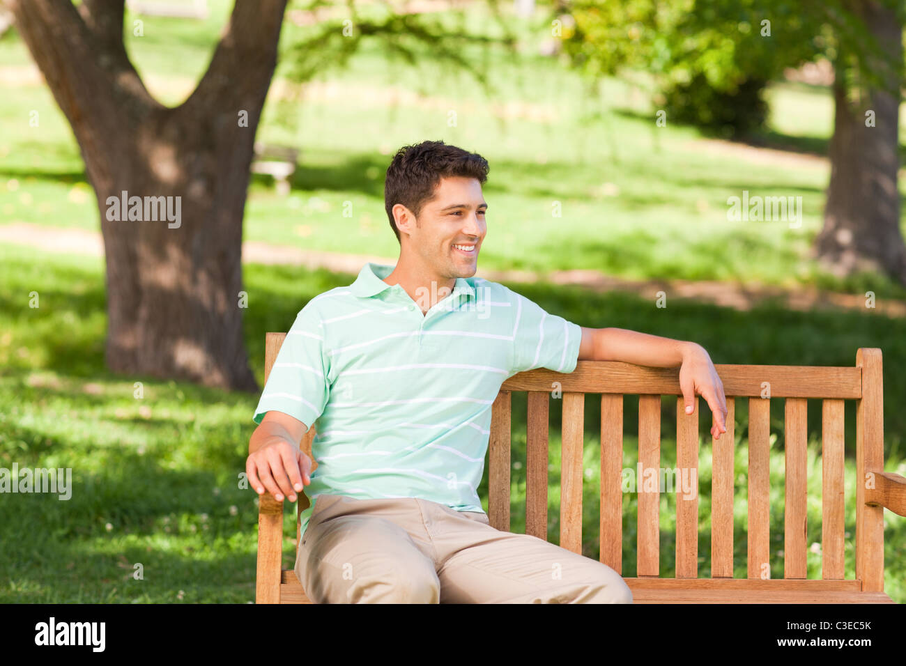 Handsome man on the bench Stock Photo Alamy