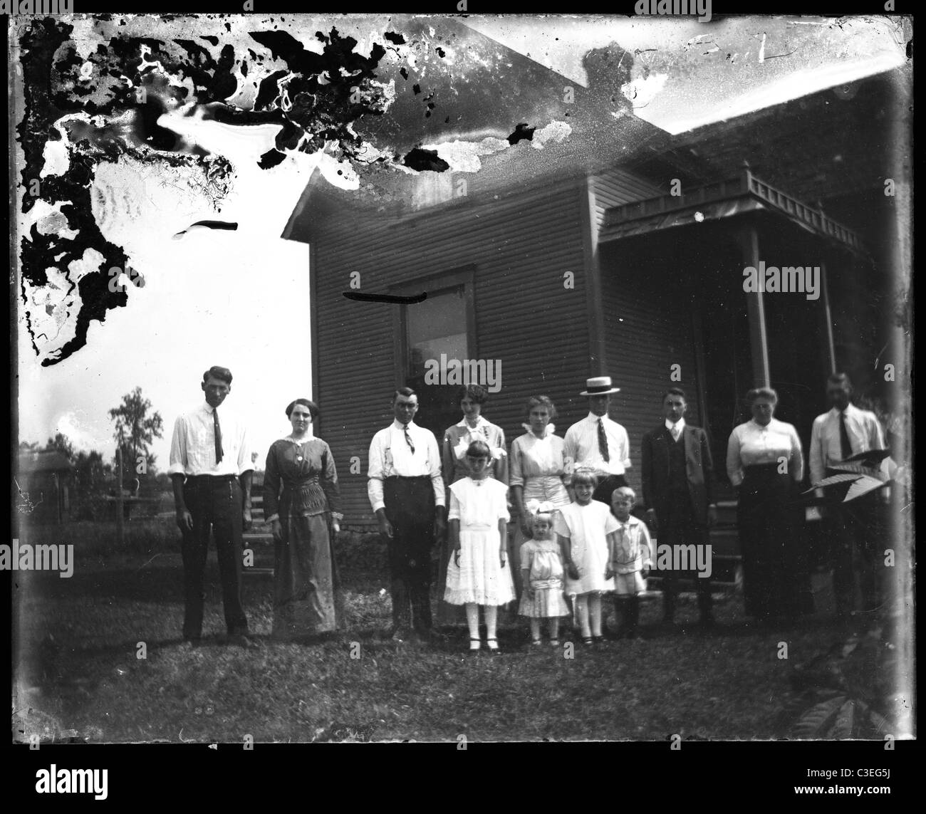 wealthy American gothic family outdoors wooden house 1890s family reunion photo Stock Photo