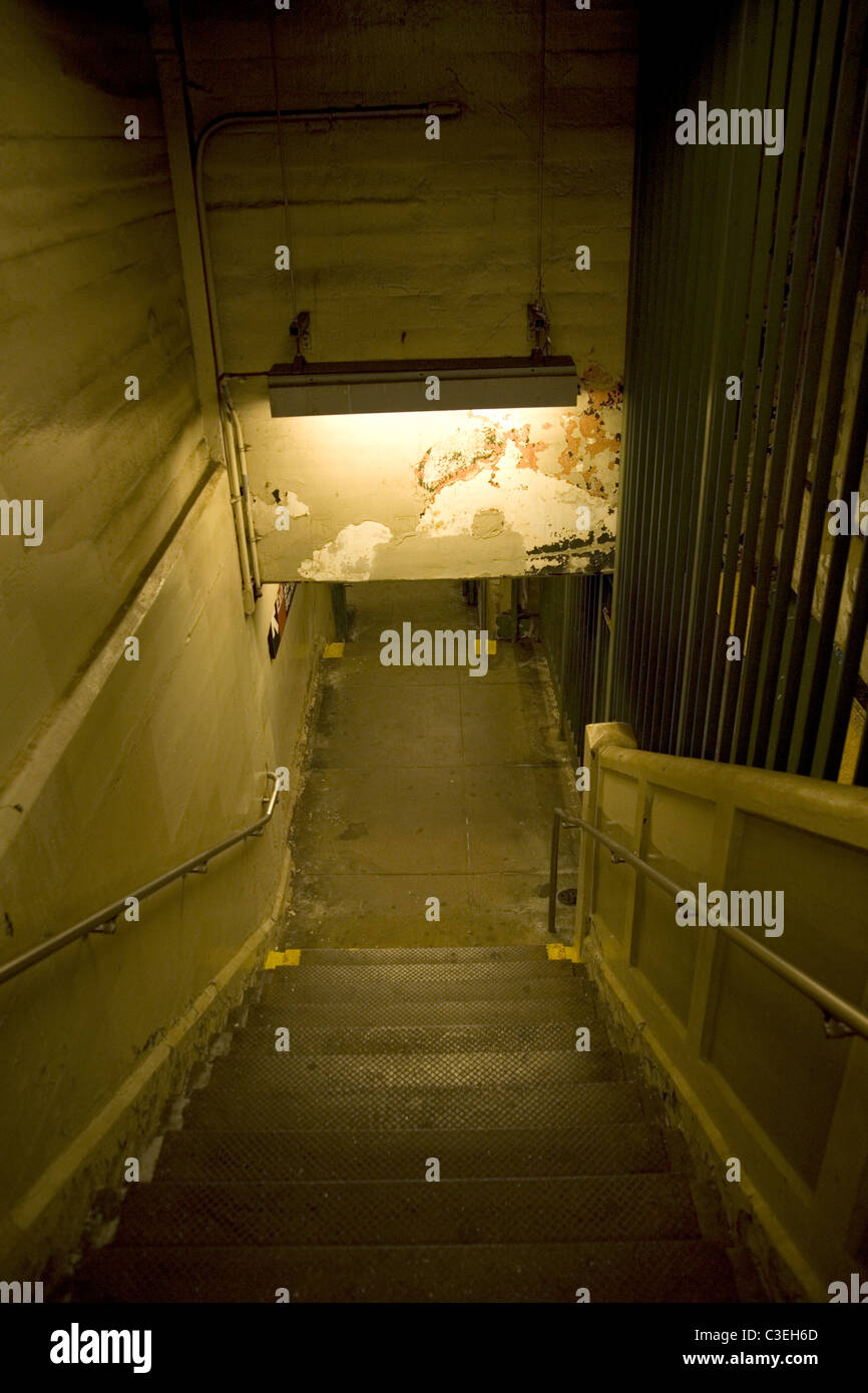 Ominous stairway leading to a subway platform in New York City. Stock Photo