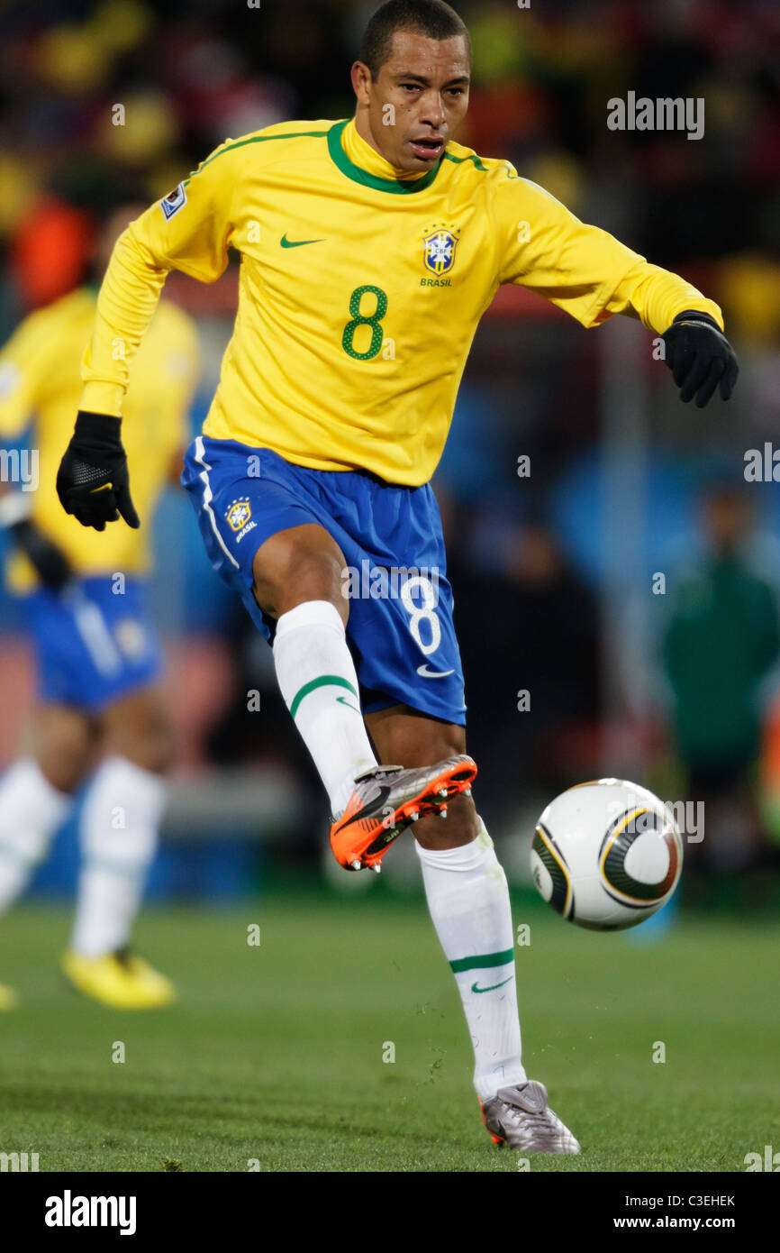 Gilberto Silva of Brazil kicks the ball during a a 2010 FIFA World Cup football match against North Korea June 15, 2010. Stock Photo