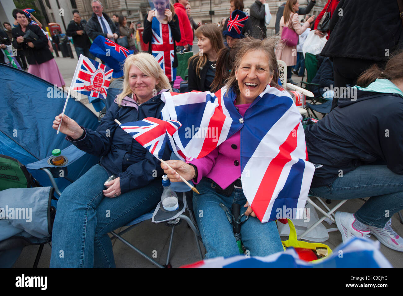People camping out along the route of the Royal Wedding procession of Prince William and Kate Middleton, London 2011. Stock Photo
