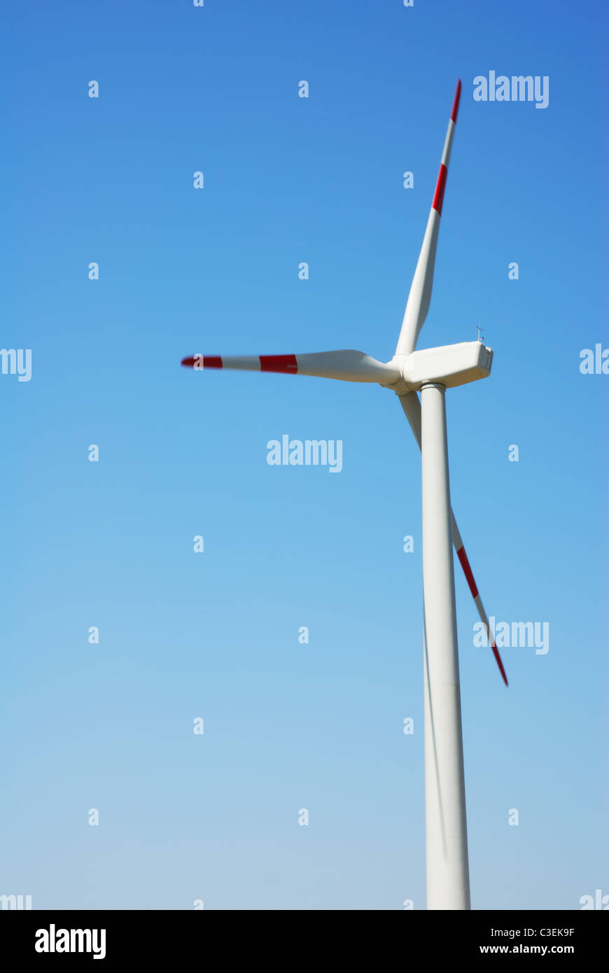 Close-up of wind turbine with clear blue sky Stock Photo - Alamy