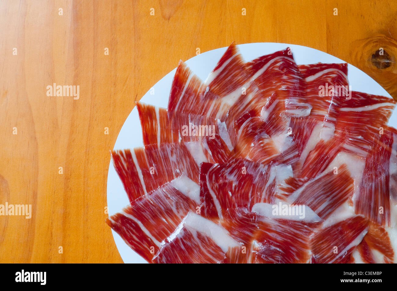 Iberian ham serving. Spain. Stock Photo