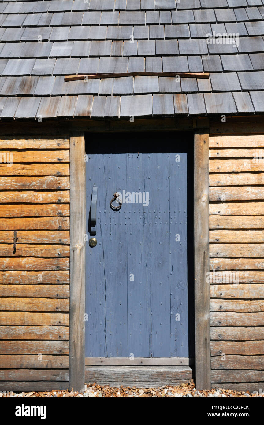 Entry wood door to the Historic Aptucxet trading post built by the Pilgrims for trading with Wampanoag indians and the Dutch. Stock Photo