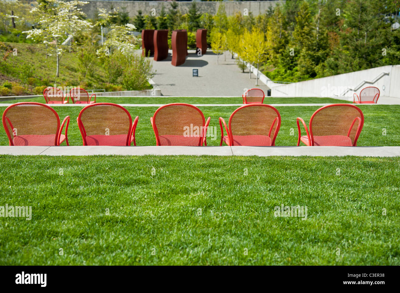 Red Metal Chairs On A Lawn At Seattle Art Museum S Olympic