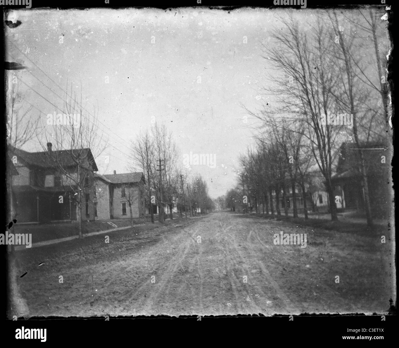 empty street with horse and buggy tracks pre-automobile main small town avenue 19th century 1890s Stock Photo