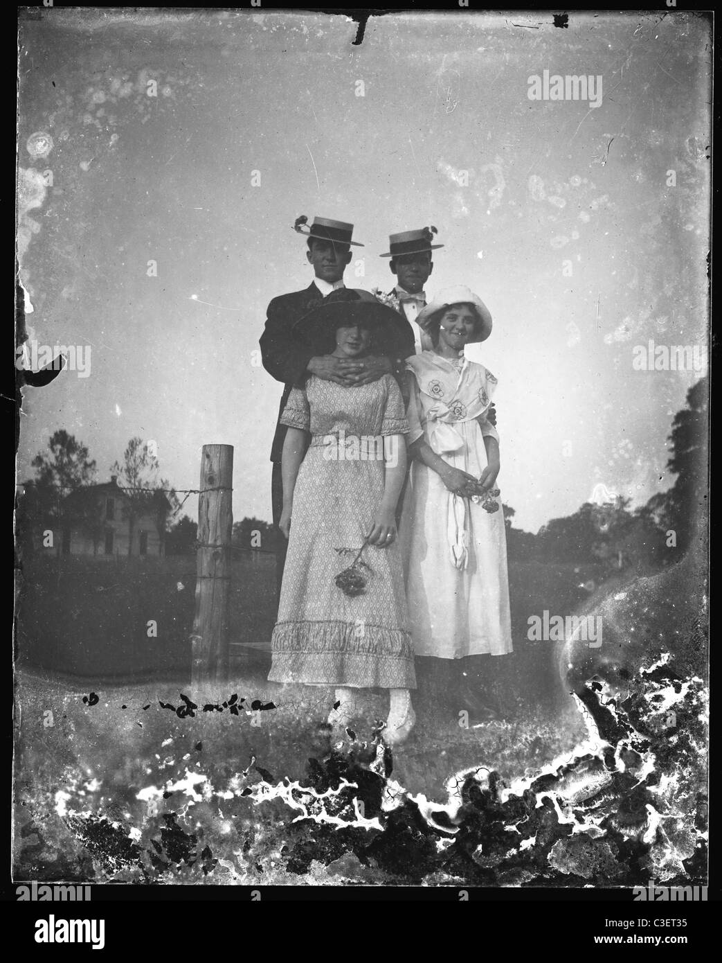 two couples women men dresses farm clothing 1890s Stock Photo