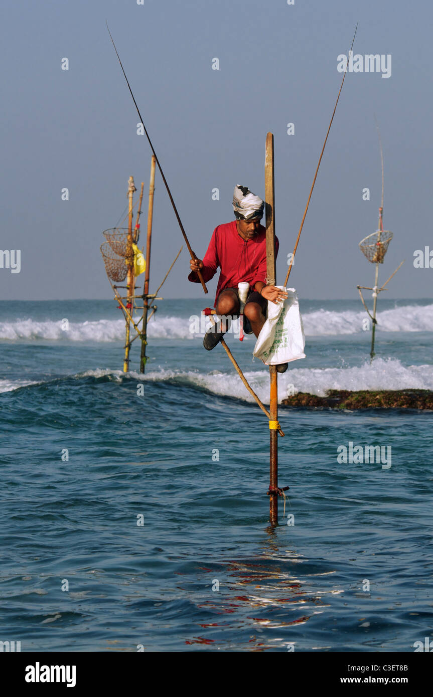 Pole fisherman Koggala Beach South Coast Sri Lanka Stock Photo
