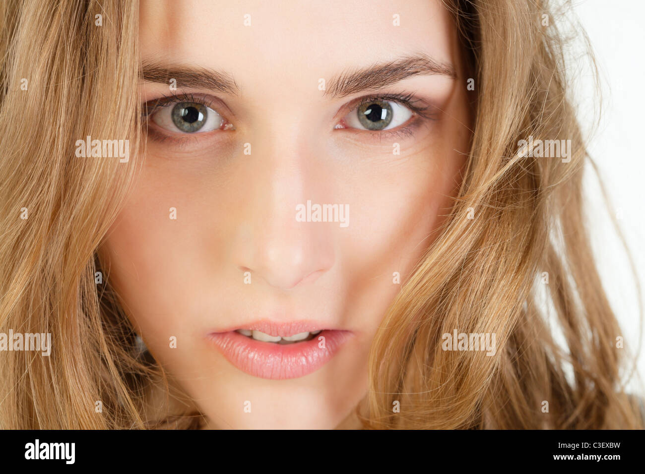 Close-up portrait of pretty young woman with long blond hair Stock Photo