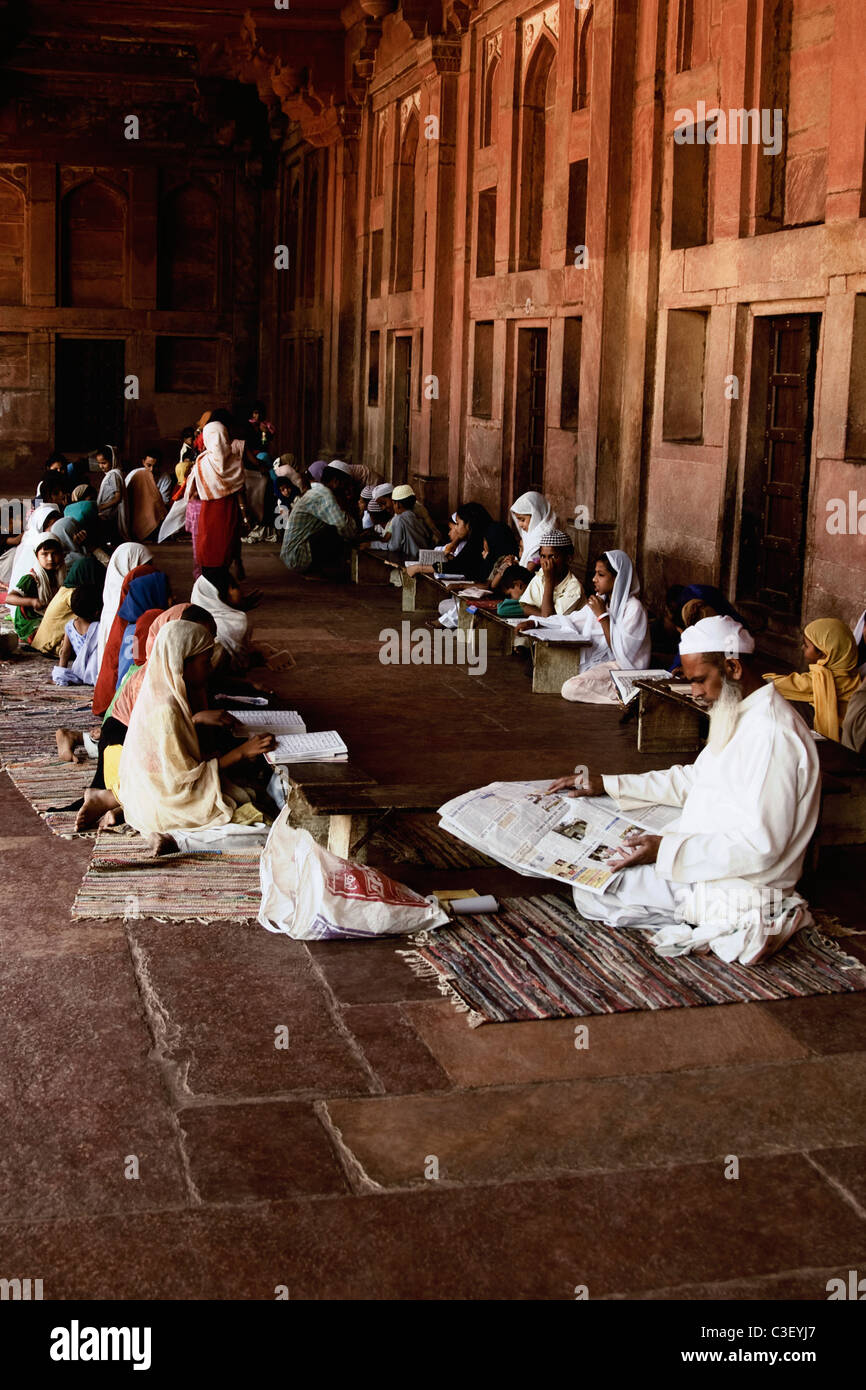 Students studying in madrasa, Agra, Uttar Pradesh, India Stock Photo
