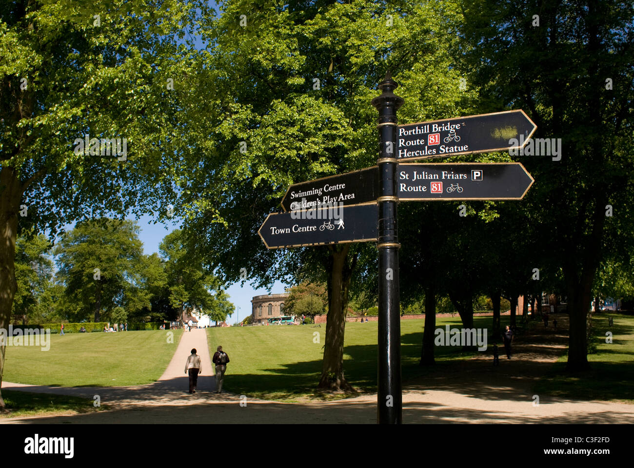 Signpost in The Quarry, Shrewsbury's park. The crowds are enjoying the