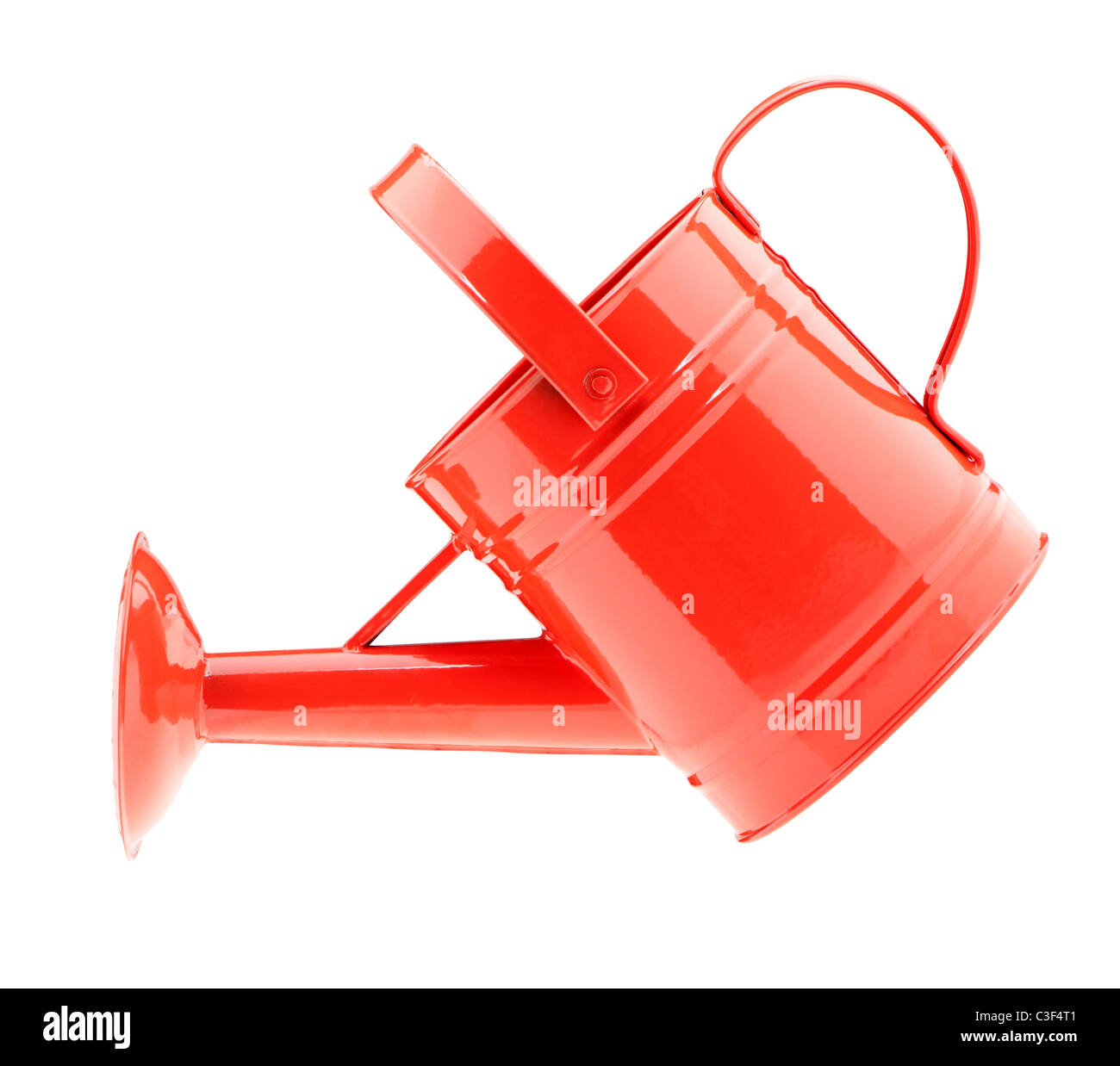 Red watering can. It is isolated on a white background Stock Photo - Alamy