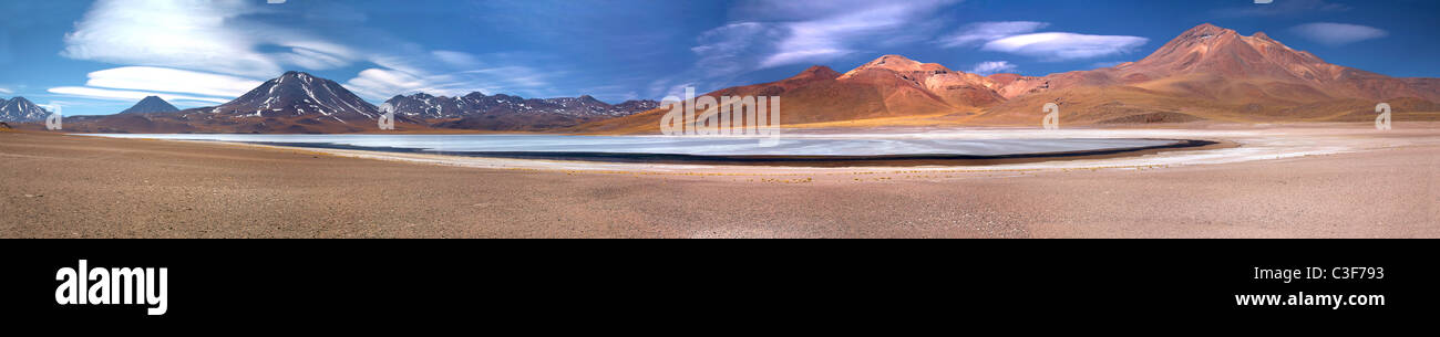 panorama of altiplanic lagoon Miscanti and volcanoes Miniques and Miscanti, desert Atacama, Chile Stock Photo