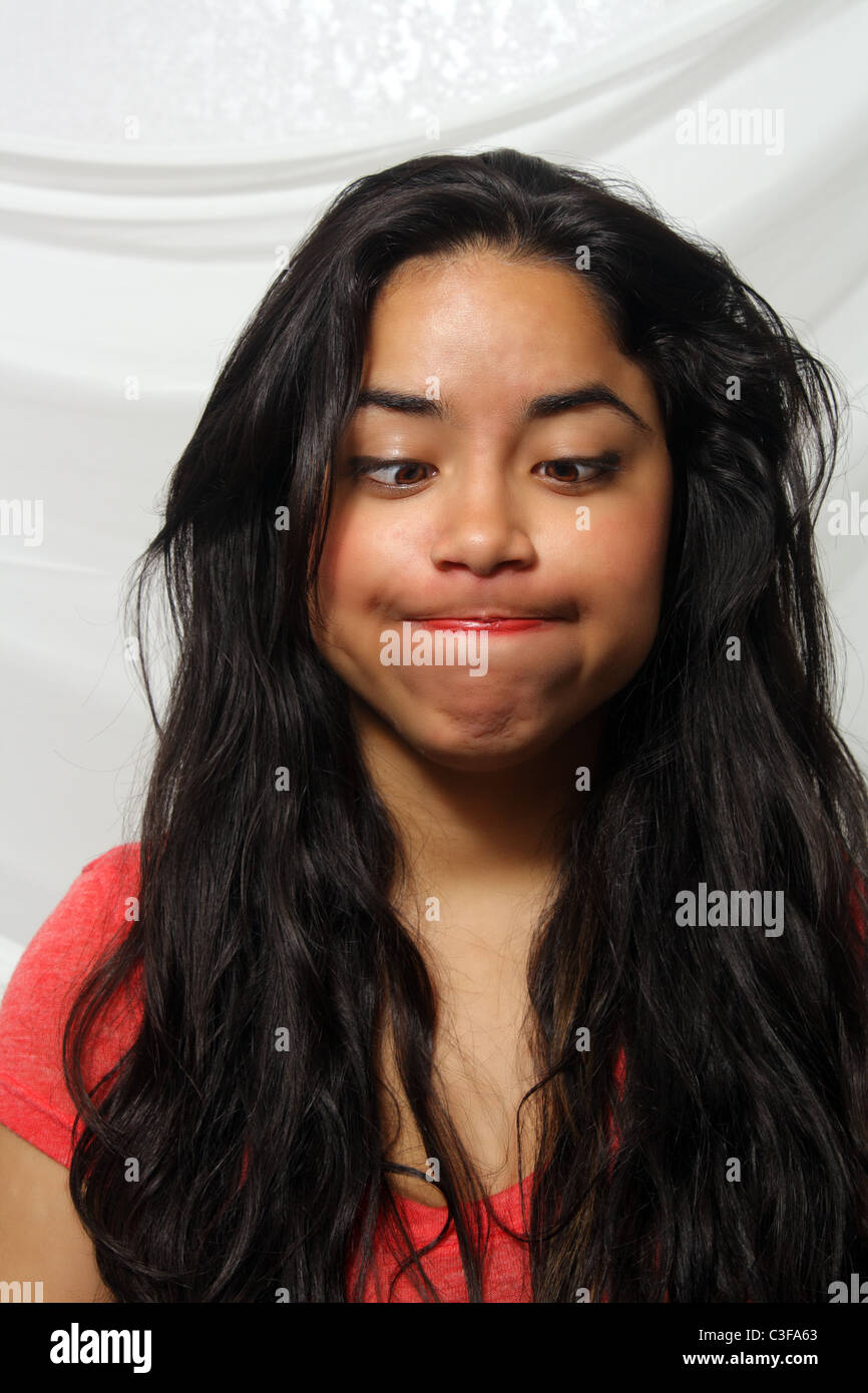 Cross Eyed Girl Making A Face At Studio Shot Stock Photo - Download Image  Now - Cross-Eyed, Women, One Woman Only - iStock