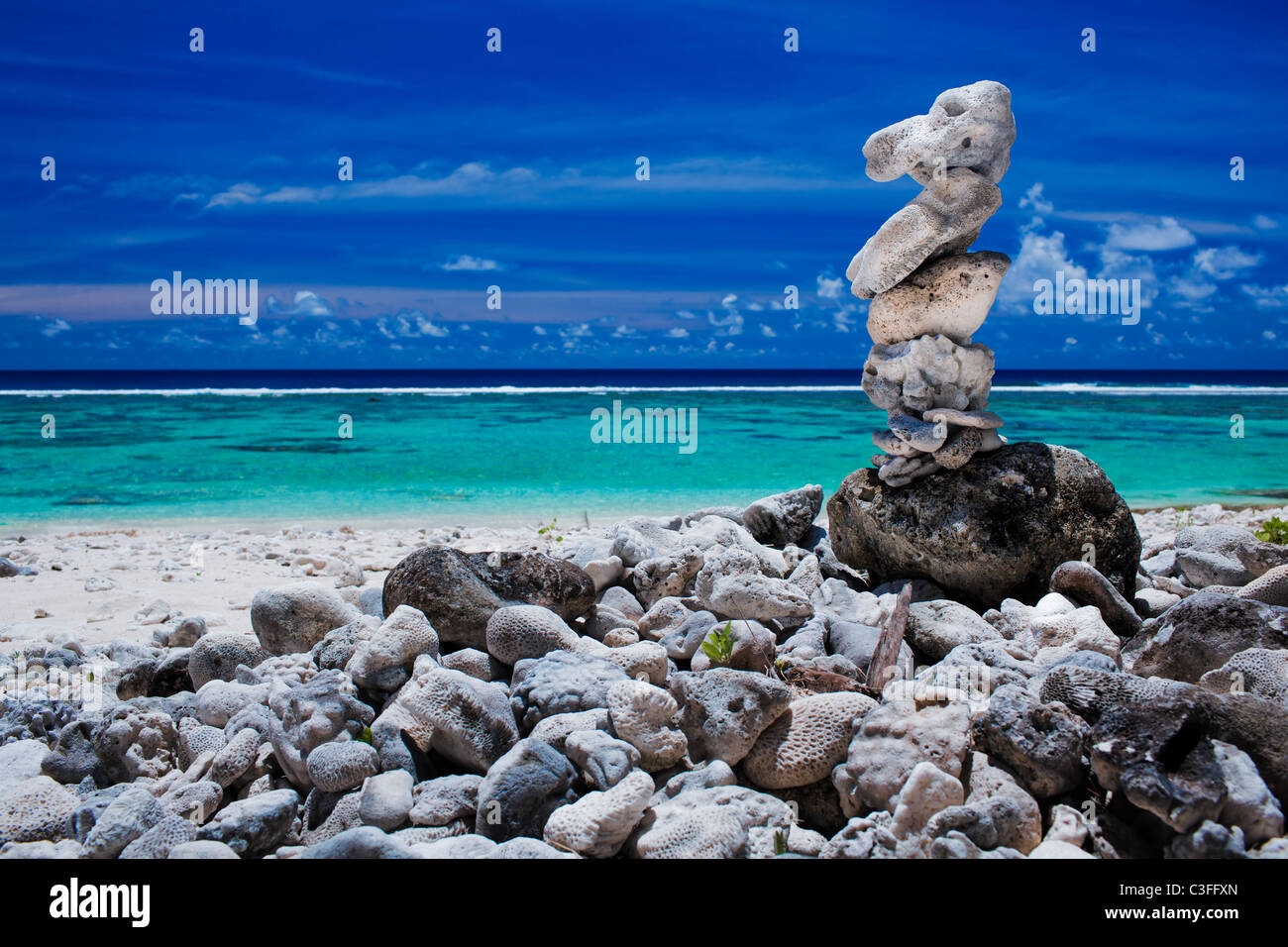 Stack of reef stones on a sky and tropical lagoon Stock Photo