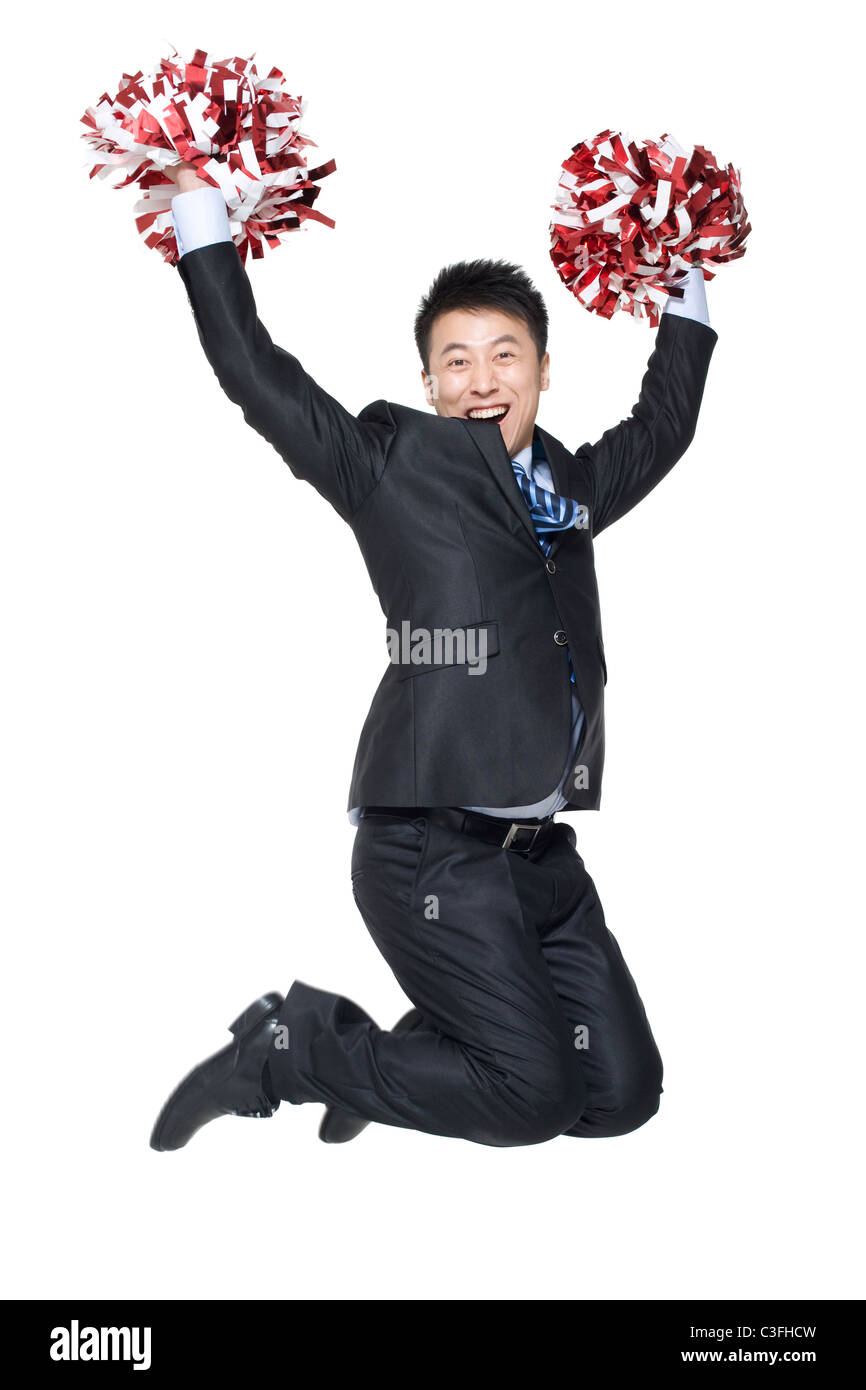 Young smiling cheerleader man jumping hi-res stock photography and images -  Alamy