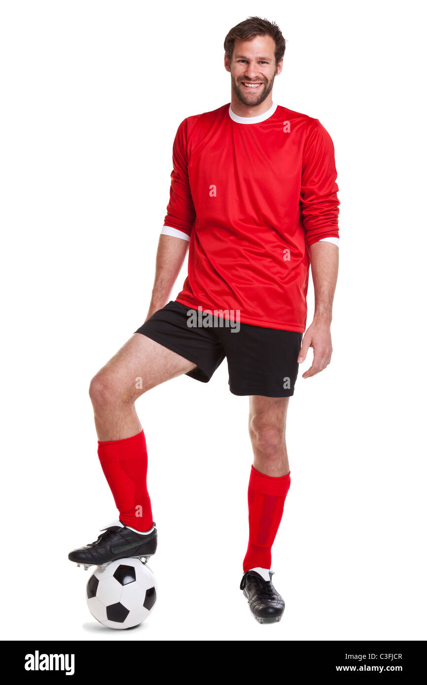 Photo of a footballer or soccer player cut out on a white background,. Stock Photo