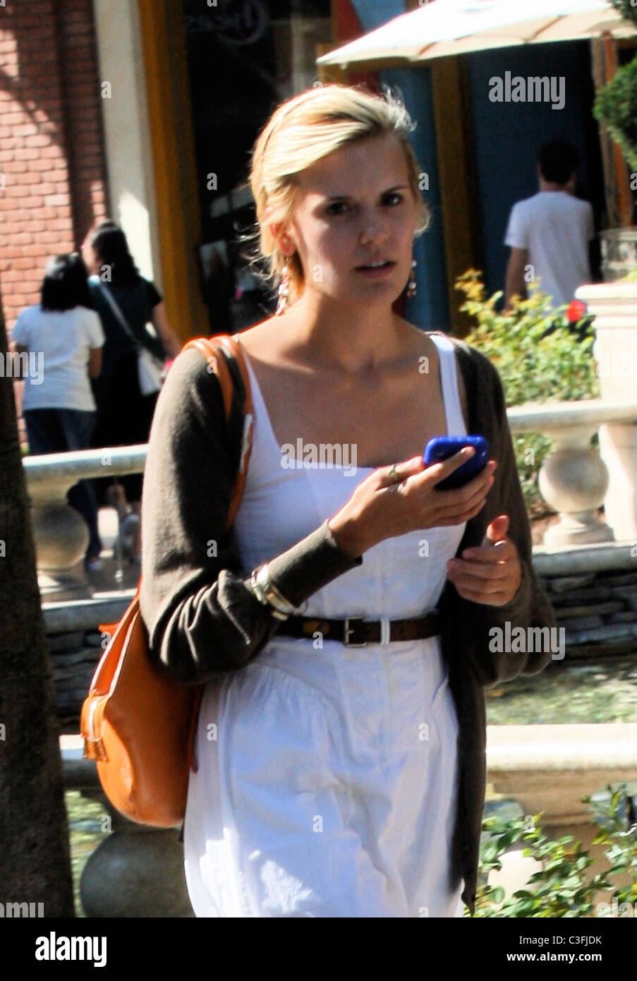 Taken' co-star Maggie Grace talking on her cellphone while out shopping in Hollywood Los Angeles, California - 20.08.09 Owen Stock Photo