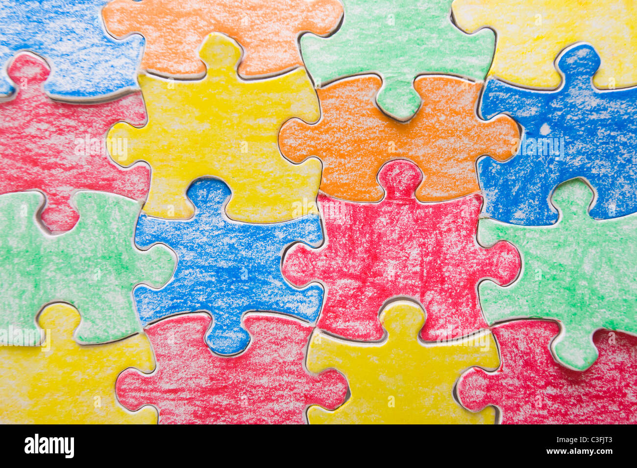 Colorful jigsaw pieces in a range of colors. Stock Photo