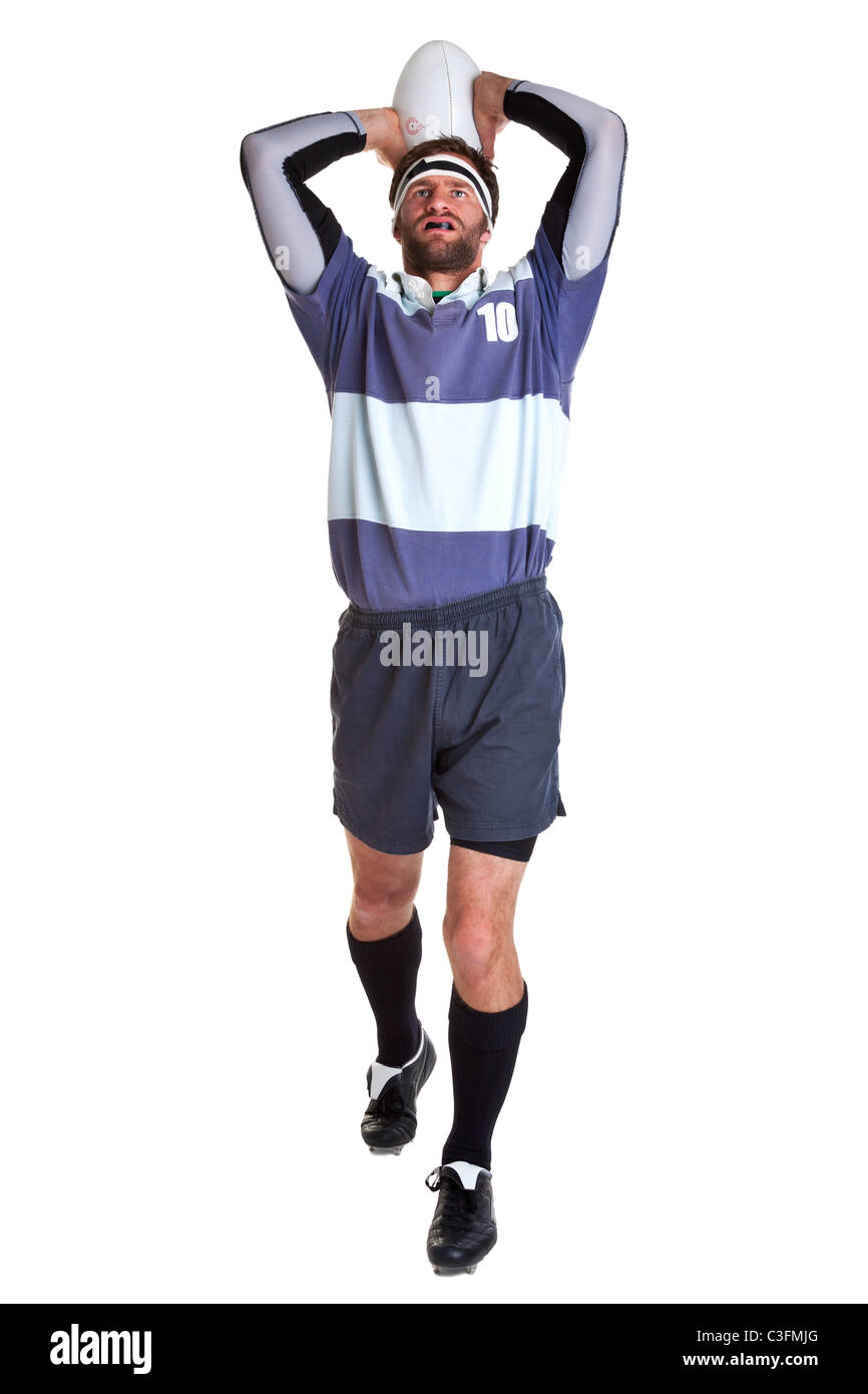 Photo of a rugby player throwing the ball for a line out, cut out on a white background. Stock Photo