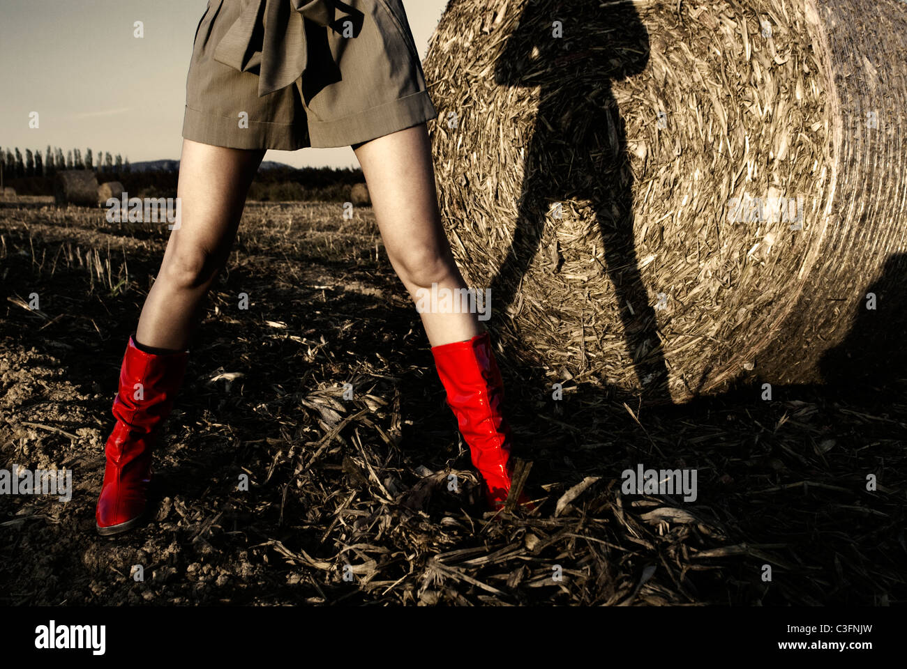 Girl in red wellington boots in field Stock Photo - Alamy