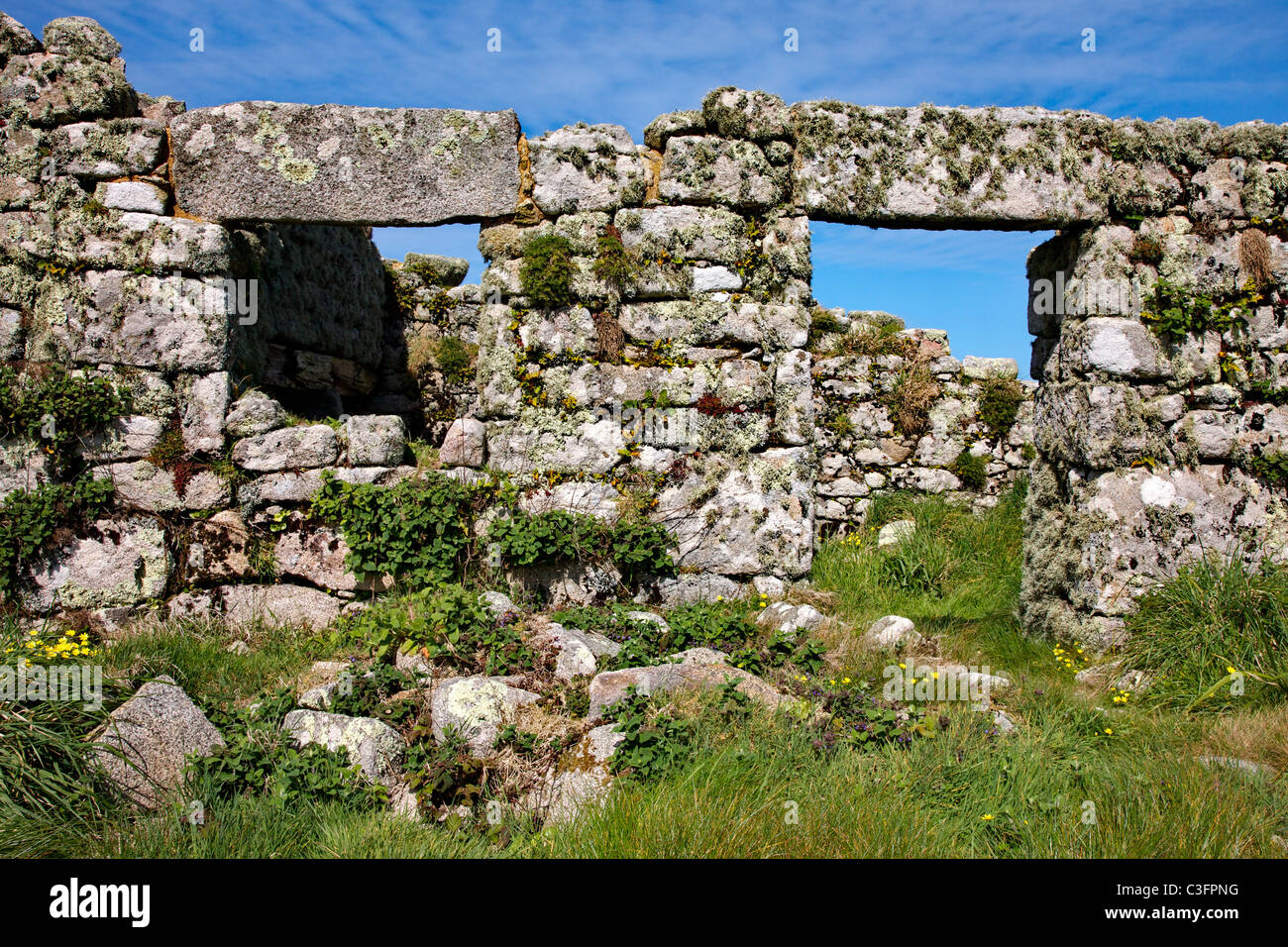 Heavy lintels of a dereiict granite house on the uninhabited island of Samson in the Isles of Scilly Stock Photo