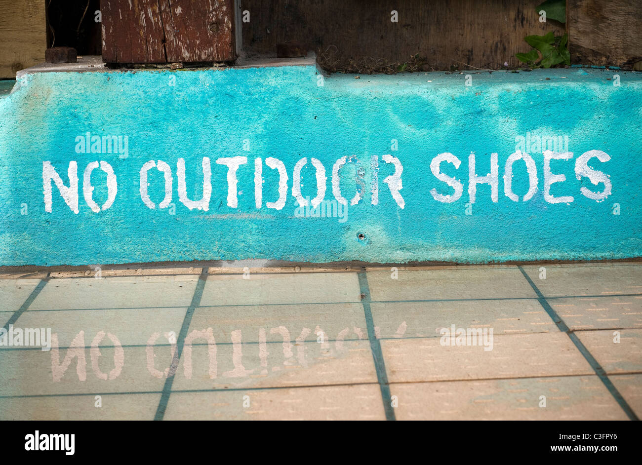 Swimming pool sign,No outdoor shoes,hygiene hypothesis Stock Photo