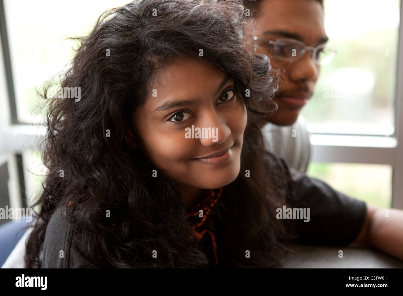 Couple hanging out in cafe Stock Photo