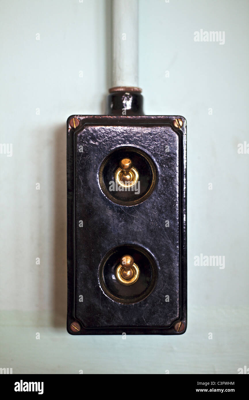 A double light switch in a classroom in the Scotland Street school