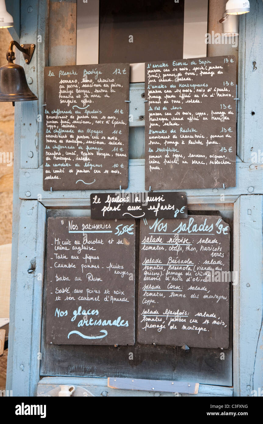 A menu outside a restaurant in Sarlat, Dordogne Aquitaine France Stock Photo