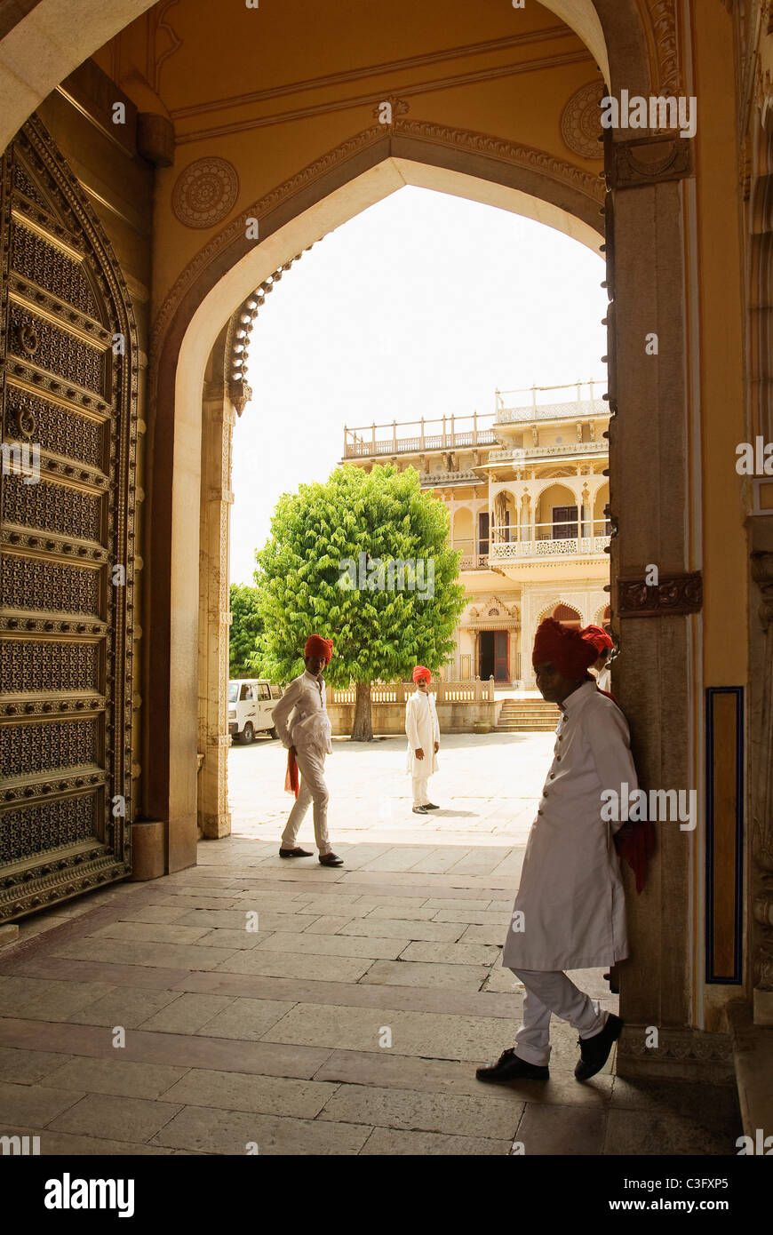 Security guards at the entrance of a palace, City Palace, Jaipur, Rajasthan, India Stock Photo