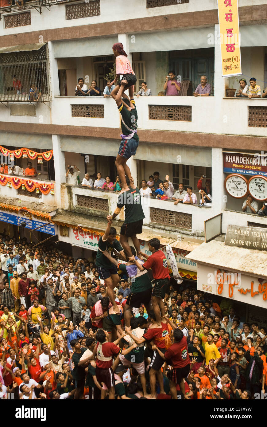 People celebrating Dahi Handi festival, Mumbai, Maharashtra, India Stock Photo