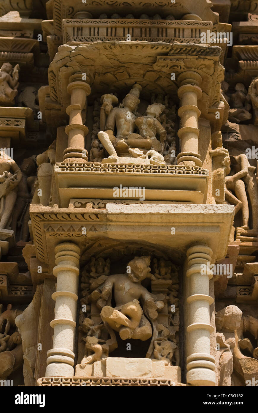 Sculptures on the wall of a temple, Khajuraho, Chhatarpur District