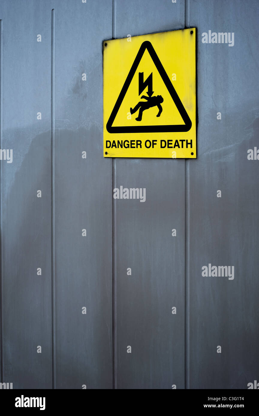 Yellow and Black Danger of Death Warning Sign Stock Photo