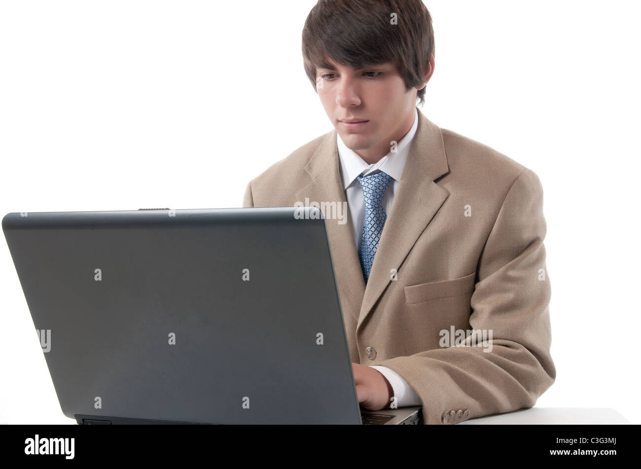 Yuppie in business attire working on notebook computer Stock Photo