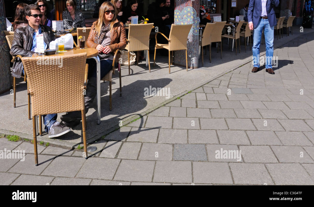 Amsterdam, Netherlands. Young couple at café table Stock Photo