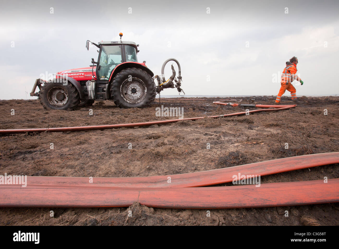 Tackling a moorland fire above Halifax following the warmest and driest April on record,UK Stock Photo