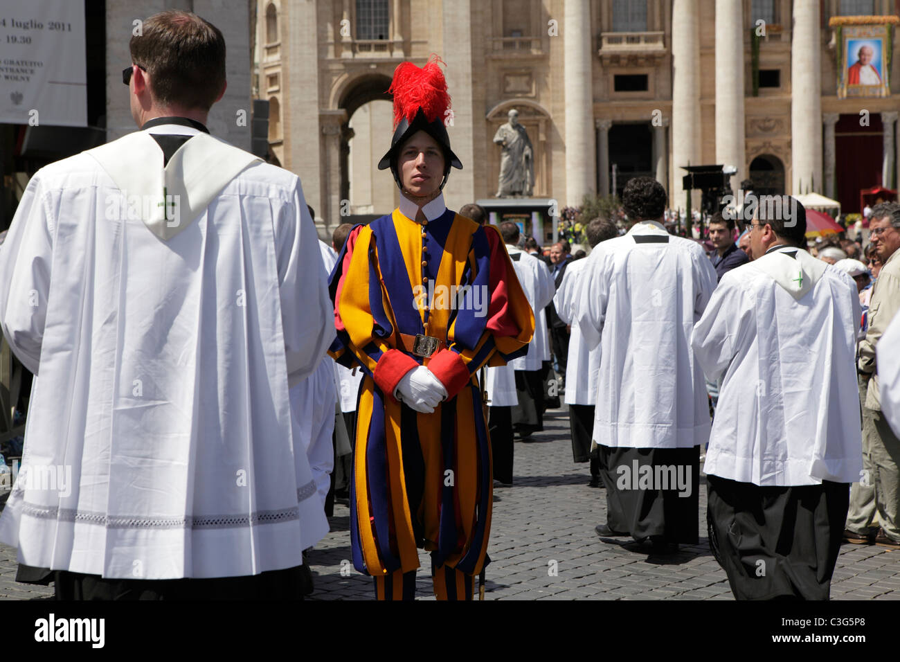 Priests giving out holy communion hi-res stock photography and images ...