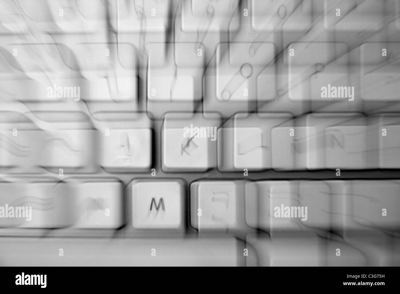 crazy keyborad zoom blurred keys as a disease metaphor Stock Photo - Alamy