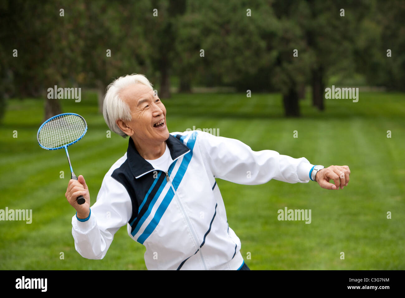 Senior Man Playing Badminton in a Park Stock Photo - Alamy