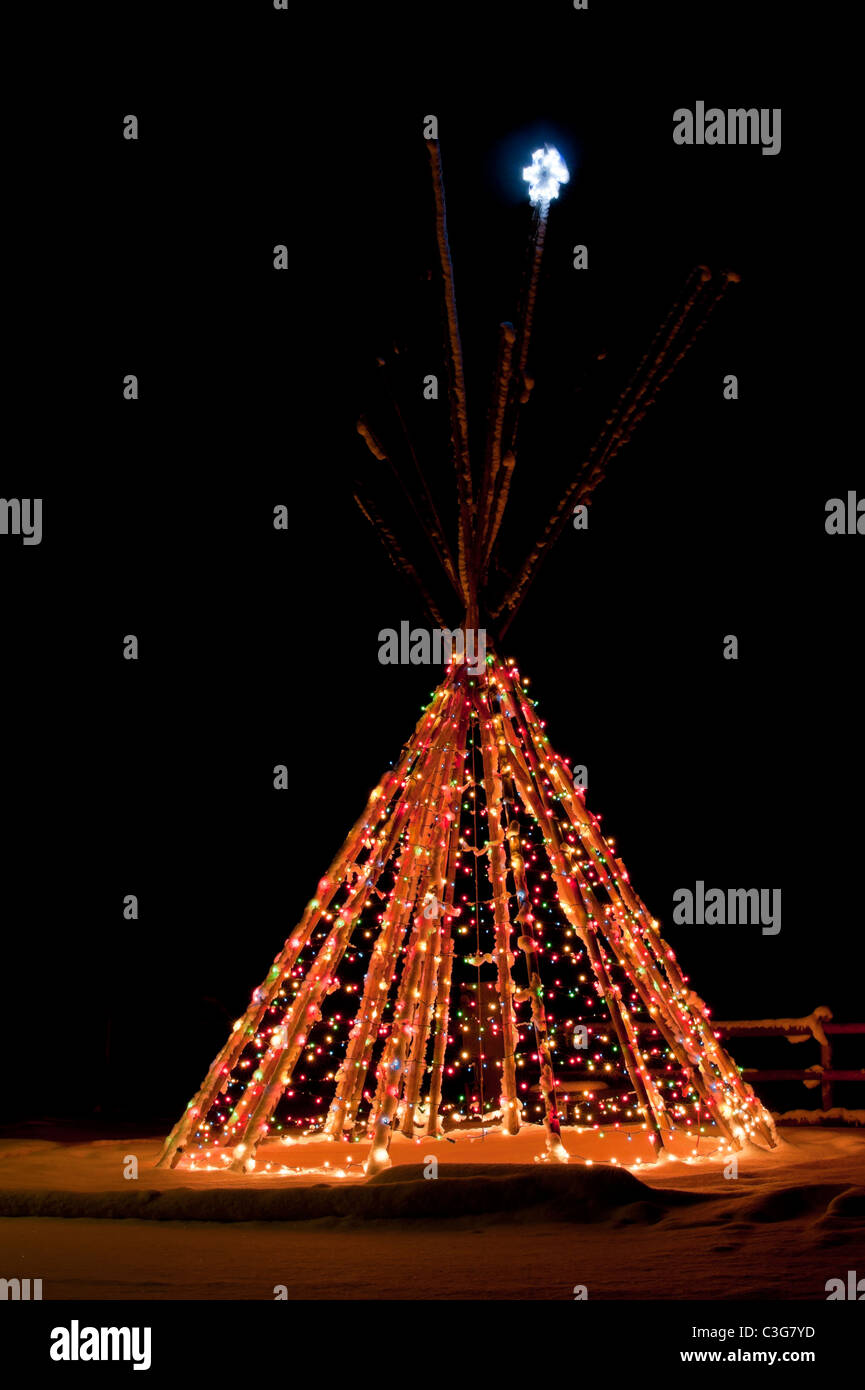 Christmas lights are strung over the tepee at the Seeley Lake Chamber