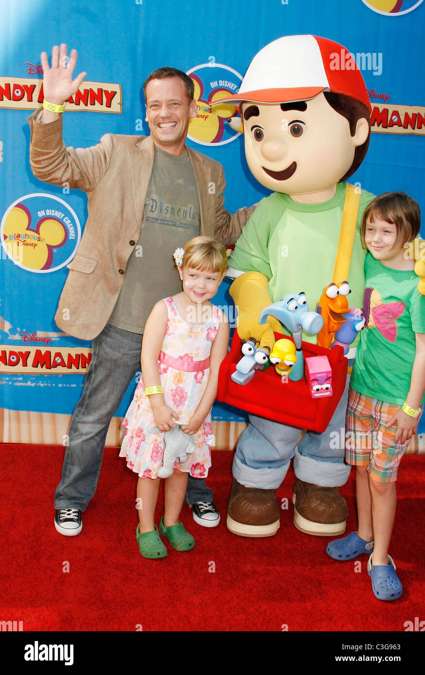Dee Bradley Baker with his daughters Cora and Josie Los Angeles premiere of Disney Channel's 'Handy Manny Motorcycle Adventure' Stock Photo