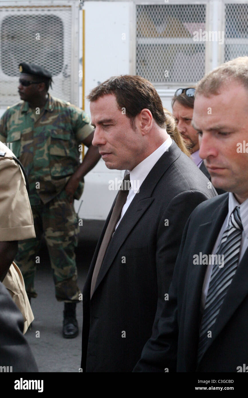 John Travolta leaving court after giving his testimony in the ongoing