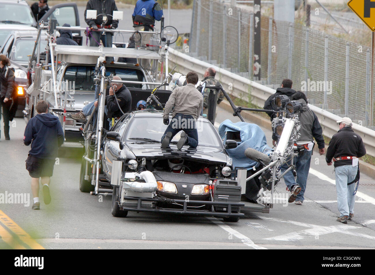 Tom Cruise filming a stunt scene on top of a car while on the set of his  new movie 'Wichita' Boston, Massachusetts - 30.09.09 Stock Photo - Alamy